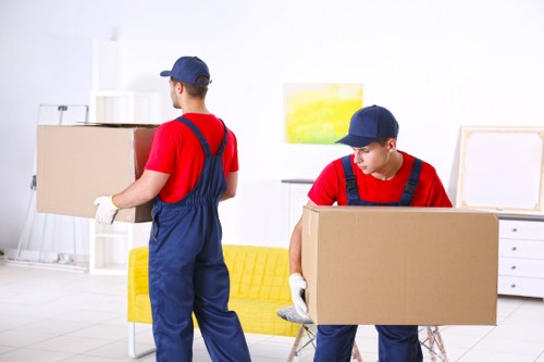 Man with van loading household items in Richmond