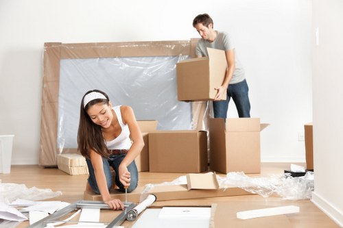 Moving boxes and furniture being loaded by a removal team in Richmond