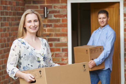 Professional movers handling household furniture in Richmond