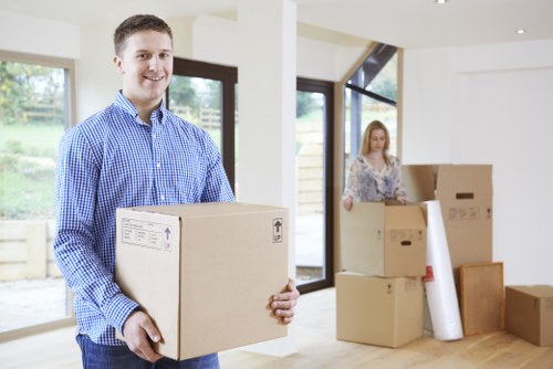 Moving team handling boxes for a Richmond home relocation