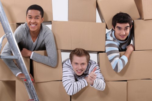 Moving van and packed boxes in a Richmond residential street