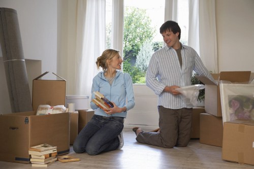 Packed moving boxes and household items ready for removal in Richmond