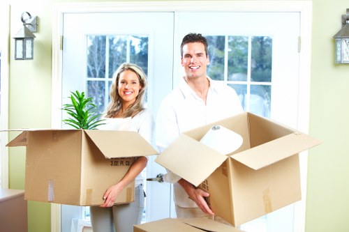 Packed boxes and furniture prepared for a Richmond home removal