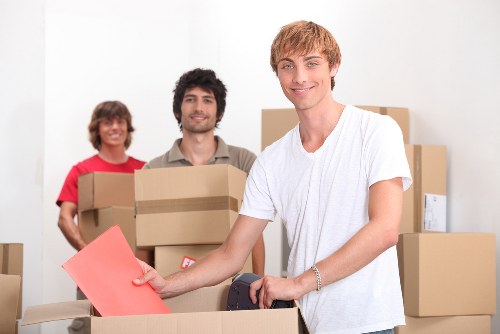 Preparing boxes and furniture for a Richmond moving truck